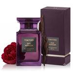 Tom Ford Oud Voyager Eau de Parfum 100 ml Flakon und Verpackung mit Oudholz und roter Pfingstrose